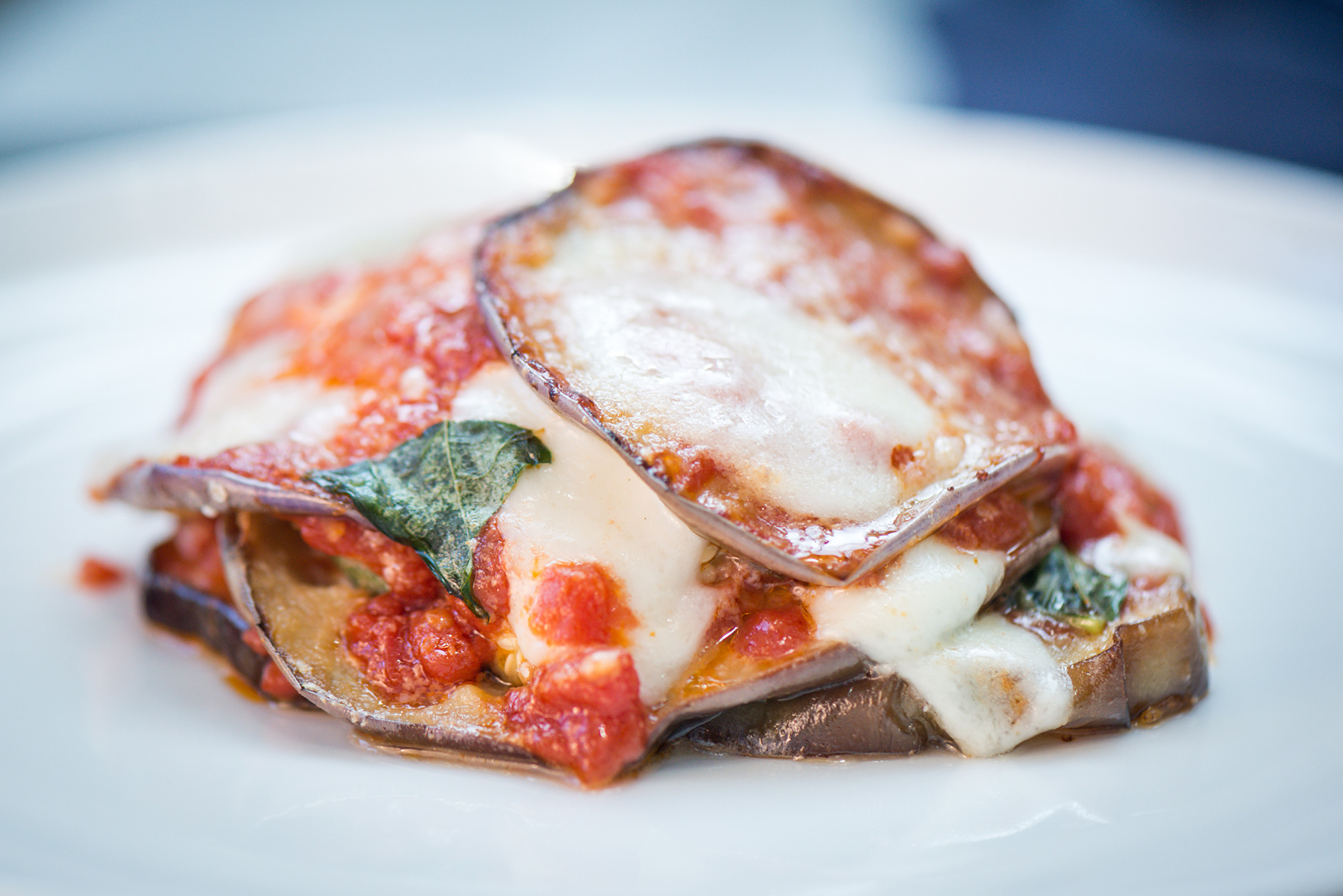 Close up of our delicious parmigiana fried eggplant, scamorza, s.marzano, parmigiano reggiano